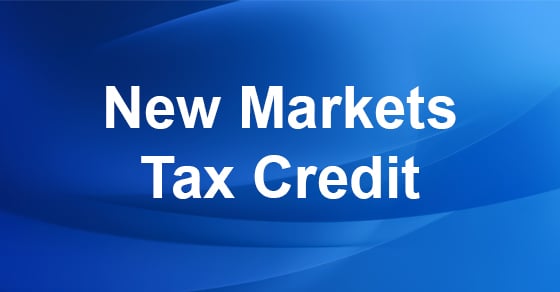 The words 'New Market Tax Credit' on a blue background.