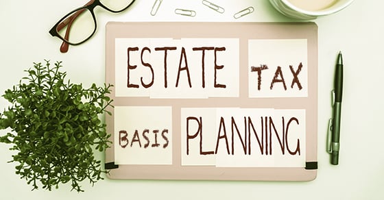 A surface with some glasses, a plant, a pen, and a board that reads "Estate Tax Basis Planning".