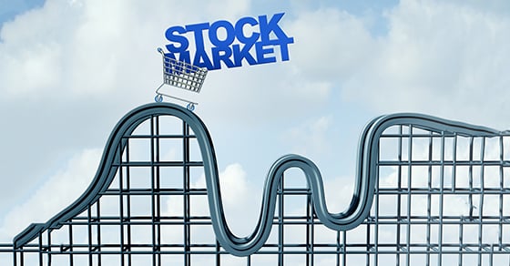 An illustration of the words "stock market" in a shopping cart on a rollercoaster.