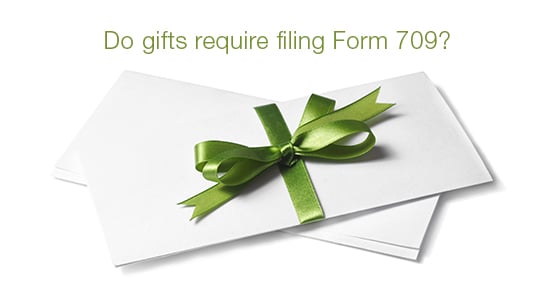 A small pile of envelopes with the top one wrapped in a green bow. Text above the envelopes reads 'DO GIFTS REQUIRE FILING FORM 709?'.