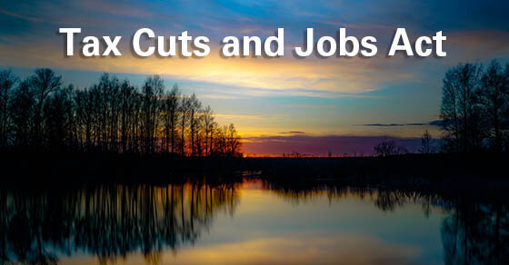 Am image of a landscape with text over it that reads 'Tax Cuts and Jobs Act'.